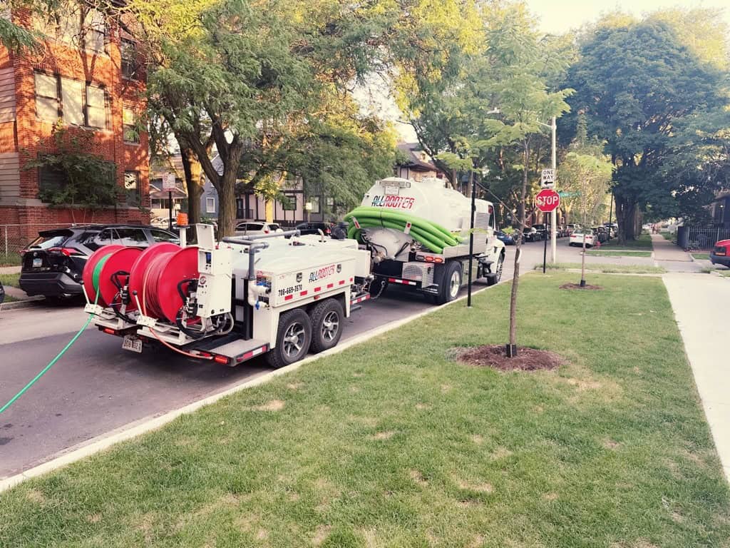 All Rooter Hydro Jetting experts pumping a catch basin in Cook County, IL, removing debris and water buildup for smooth stormwater management